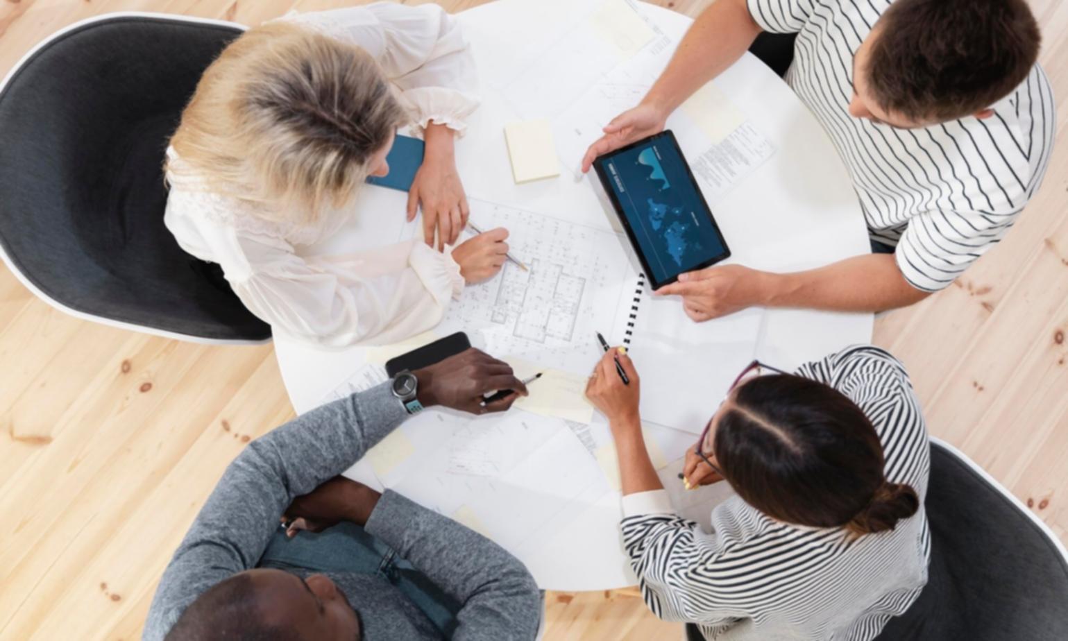 Financial analyst reviewing complex market data charts and investment research